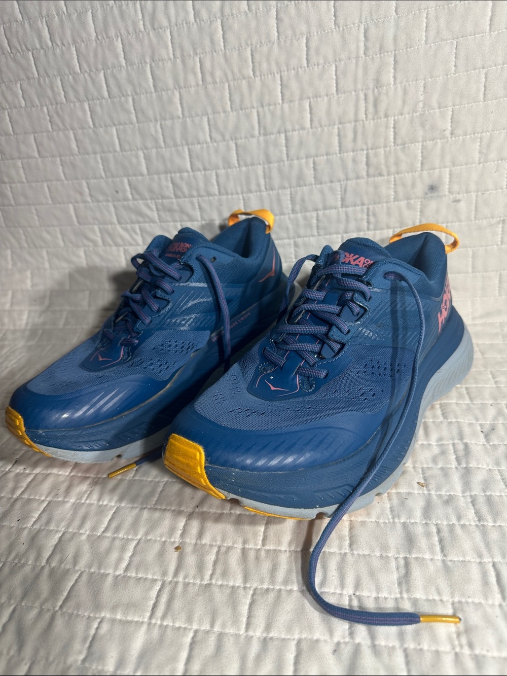 HOKA Stinson ATR 6 trail running shoes in Moroccan Blue and Saffron